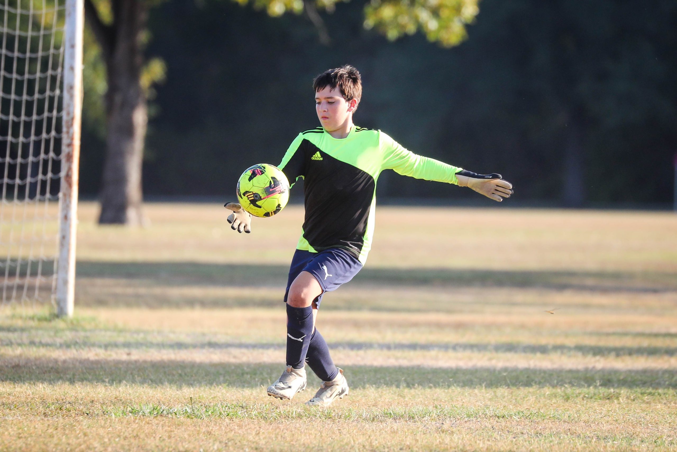 Goalkeeper kicking ball